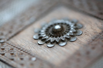 close up of metal work on an antique box