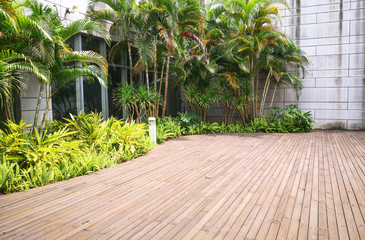 Wooden floor and plants in the courtyard.