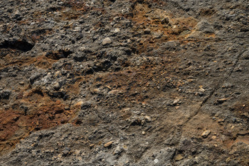 Texture of stone, rocks, textured orange with hard light