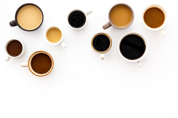 Lots of coffee on white table top view copy space