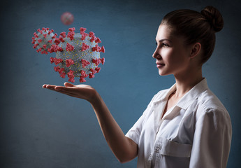 Female doctor presents viral cell coronavirus.