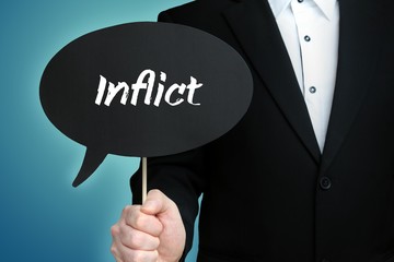 Inflict. Lawyer in suit holds speech bubble at camera. The term Inflict is in the sign. Symbol for law, justice, judgement