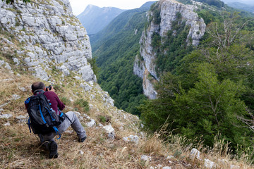 hiker take photo on mountain peak Alburni