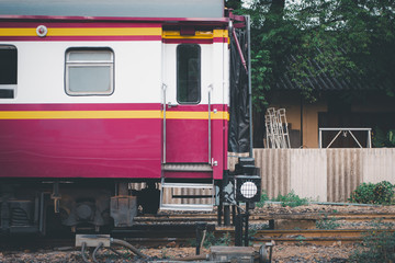 Thai railway train with locomotive runs in Bangkok