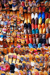 Colorful leather moroccan slippers. Souvenirs for sale on the street in a shop in Morocco