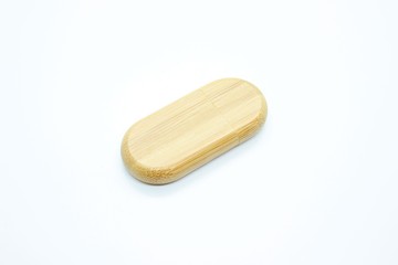 Wooden flash memory is located on a white background