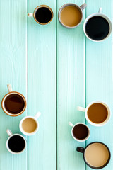Lots of coffee on green table top view copy space