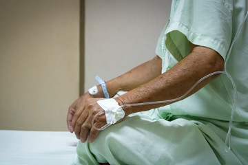 Patient with saline intravenous in the hospital