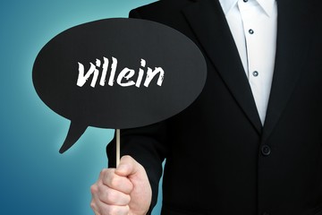 Villein. Lawyer in suit holds speech bubble at camera. The term Villein is in the sign. Symbol for law, justice, judgement