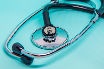 stethoscope on a blue background close-up. medical examination concept