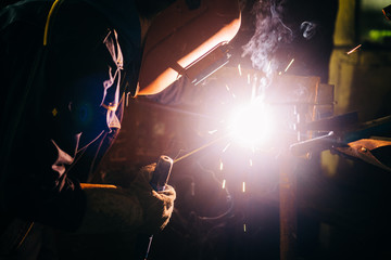 Industry worker welding at work