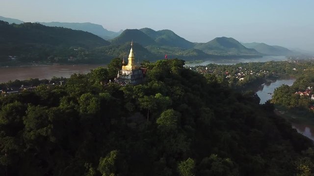 Laos, Luang Prabang, Drone Aerial View of Phousi Hill With Buddhist Shrine and Amazing View on Mekong and Nam Khan River Confluence