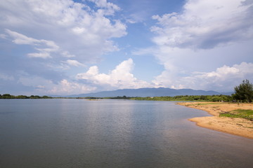 seascape view and mountain reflection on river .