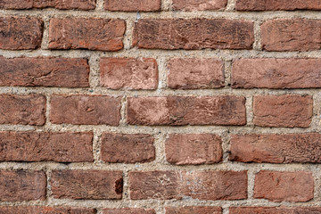 Brick wall texture background. Pattern of weathered old cracked brickwall.