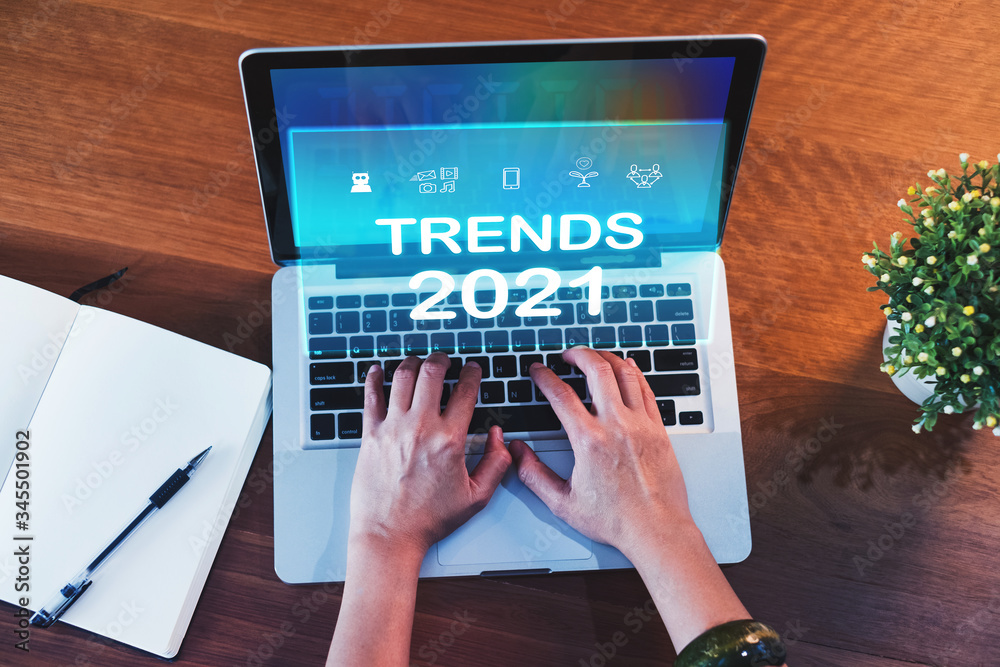 Poster trends for 2021 augmented reality (ar) floating screen with hand typing keyboard on laptop and noteb