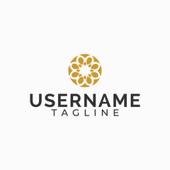 Mandala flower logo on a white background.