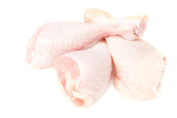 Raw chicken legs isolated on white background