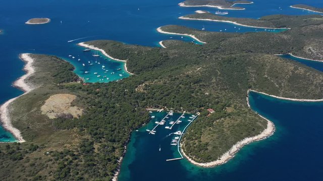 Paklinski Islands near City of Hvar in Croatia, beautiful Aerial Panoramic View of Beach Palmizana with Yachts and Sailboats on the Tirkiz Blue Sea