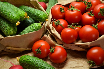 Fresh vegetables from farmers market. Cucumbers, tomatoes, radish. Pickle cucumbers. Organic vegetables. Salad ingredients.