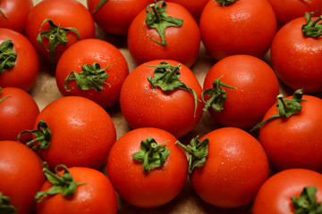 Tomatoes from farmers market. Fresh red tomato. Pickle cucumbers. Organic vegetables. Salad ingredients.