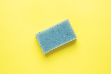 Natural soap on a yellow background. Flat lay the concept of Spa cleanliness of hands. copy space