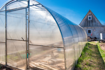 polycarbonate greenhouse in the garden
