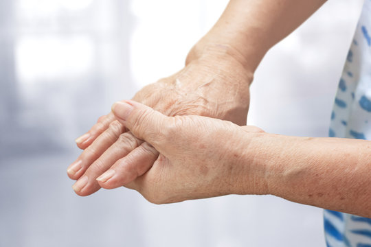 Elderly woman suffering from Beriberi pain or Peripheral neuropathiesj, Health care concept