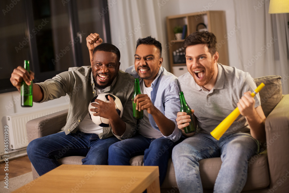 Sticker friendship, sports and entertainment concept - happy male friends with soccer ball, beer and vuvuzela supporting football team at home