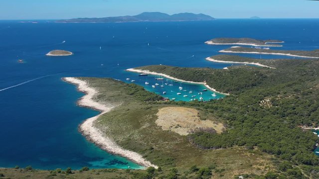 Paklinski Islands near City of Hvar in Croatia, beautiful Aerial Panoramic View of Beach Palmizana with Yachts and Sailboats on the Tirkiz Blue Sea