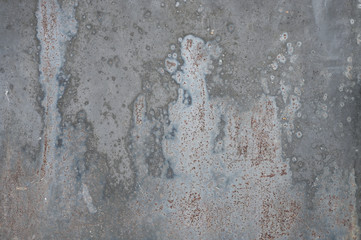gray metal background with texture. poured paint. metal texture can be used as background