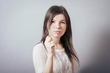 girl holding keys