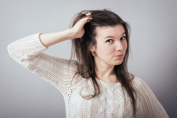 Cute  girl remembered something and holding his head