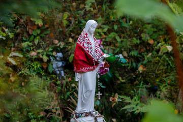 Virgin Mary statue on the Hill of Crosses in the city of Kegums, Latvia.