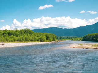 Fototapeta na wymiar river flows through the valley of Tunka