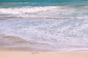 Beautiful waves on the shore of the central beach of Nha Trang, Vietnam.