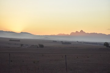 Sunrise over mountain with fog