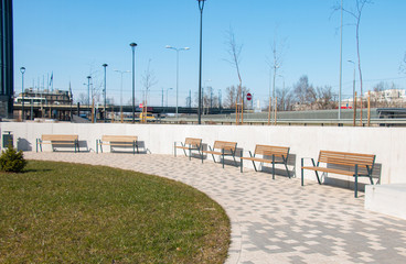 on a sunny day, empty benches for relaxing in the city because of the epidemic