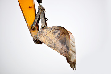 Close up excavator bucket on white background