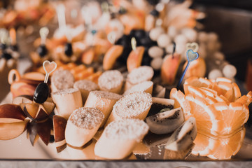 Catering services in restaurant outdoor on wedding ceremony. Food and glass of champagne. restaurant