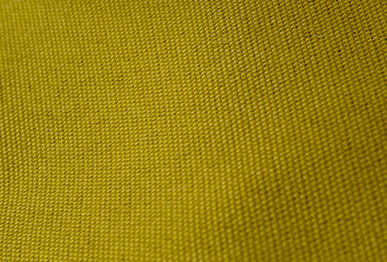 Olive background. The texture of the fabric.
