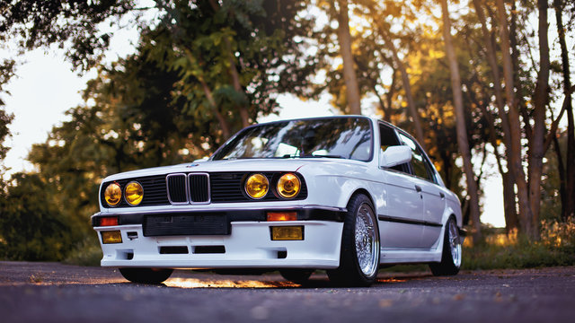 BMW M3 e30 outdors, sport wheels, tunning, glossy and shiny old classic retro oldtimer.