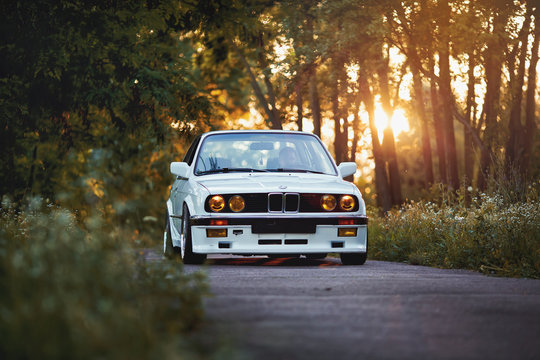 BMW M3 e30 outdors, sport wheels, tunning, glossy and shiny old classic retro oldtimer.