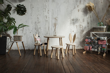 Panoramic close-up of wooden desk space made from environmentally friendly wood in  room arranged in natural colours and materials
