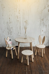 Panoramic close-up of wooden desk space made from environmentally friendly wood in  room arranged in natural colours and materials