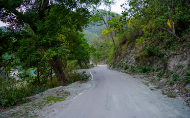 Fototapeta na wymiar Roads between mountains of Rishikesh valley, Located in the foothills of the Himalayas in northern India. 