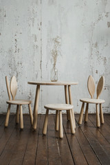 Panoramic close-up of wooden desk space made from environmentally friendly wood in  room arranged in natural colours and materials