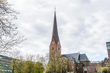  Clock tower of St. Peter's Church in Hamburg, a Protestant cathedral since the Reformation and its congregation forms part of the Evangelical Lutheran Church in Northern Germany