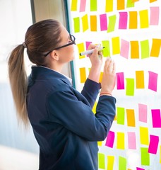 Beautiful female employee with many conflicting priorities