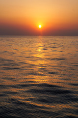 beautiful sunrise and ship on sea 