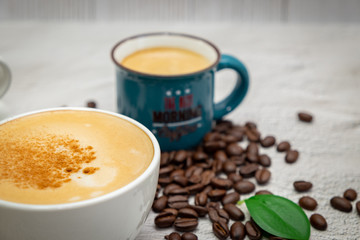 Coffee and coffee beans on white background